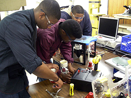 Nimitz-High-ROV-Team-Heads-to-NASA-MATE-TX-Regional-Contest-Kenneth-Field,-Malik-Randle-and-Jamarius-Monroe-work-on-Renegator